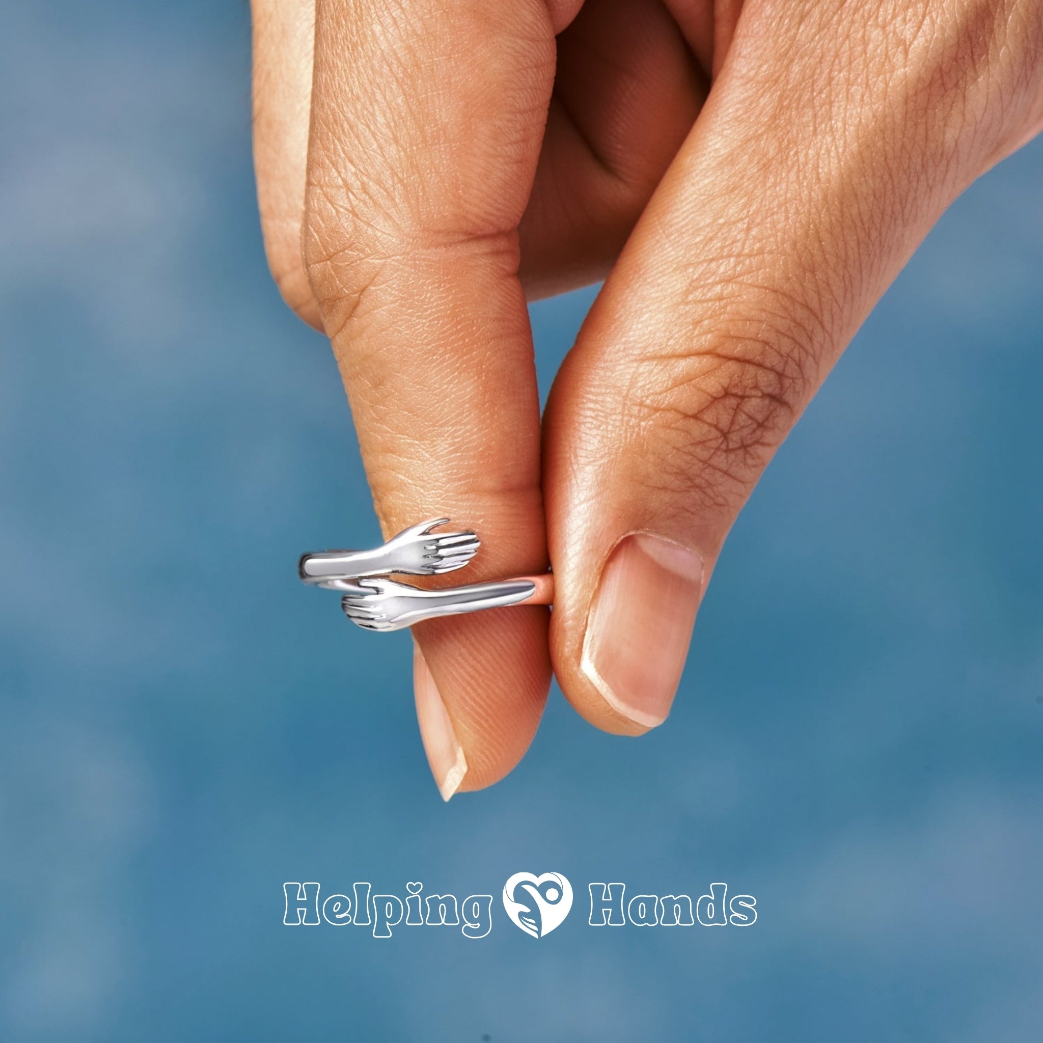 Elegant open ring with embracing hands design, a meaningful gift for couples, friends, or family.

