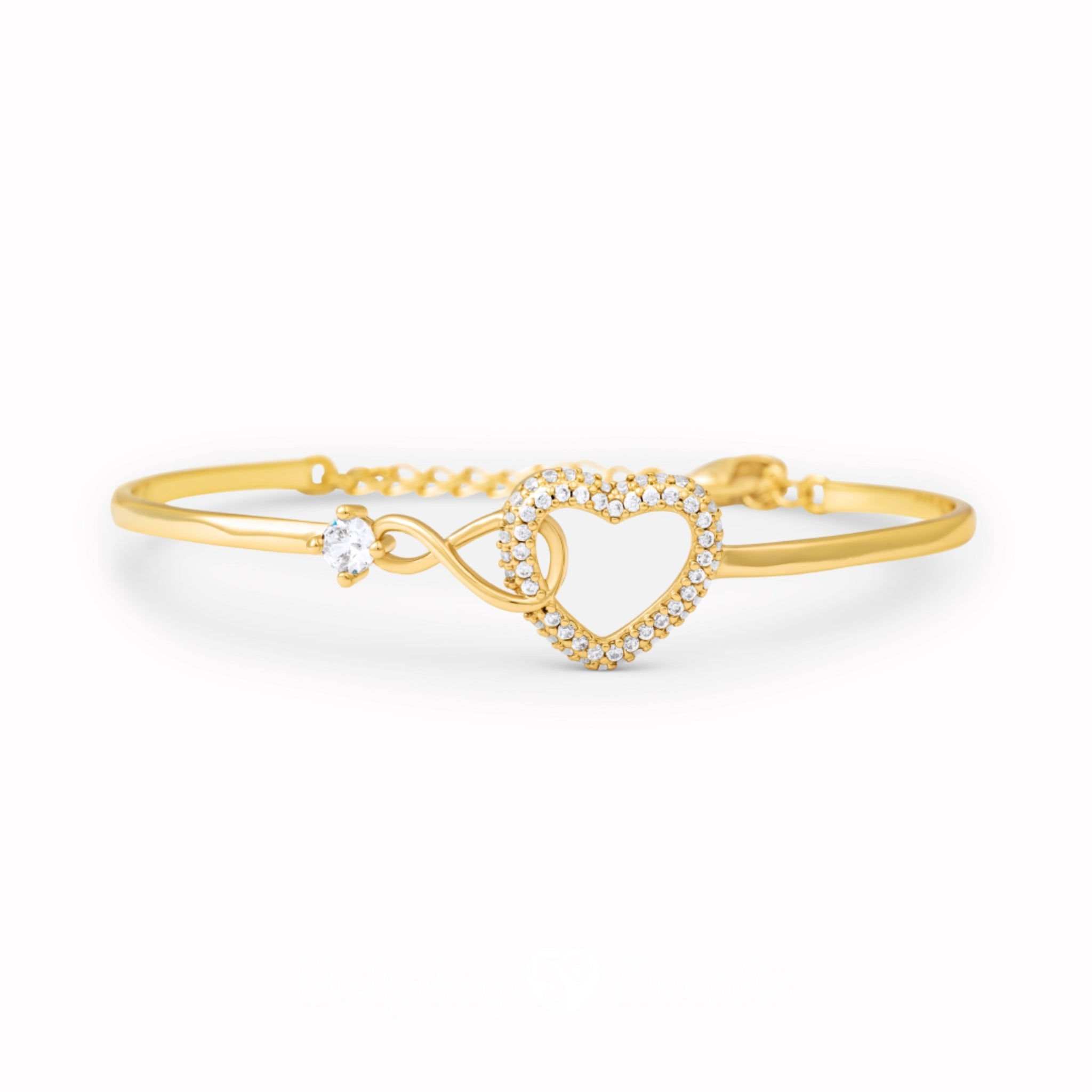 Gold bracelet with heart and infinity charm on wrist







