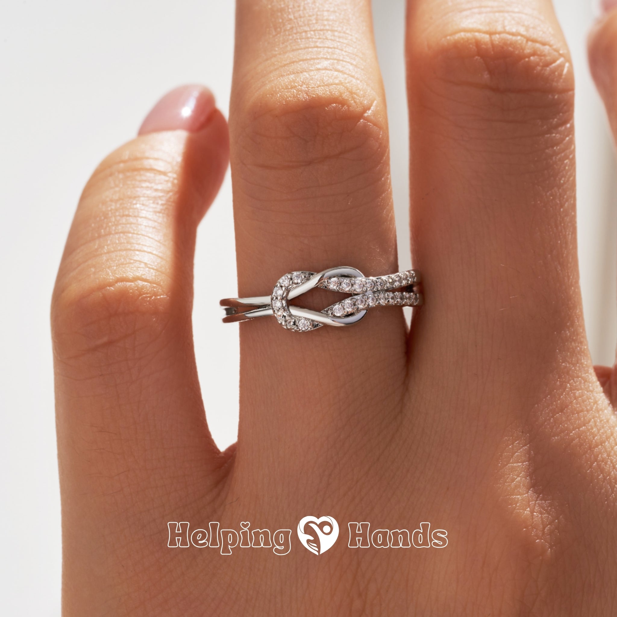 Sleek silver ring with polished beads

