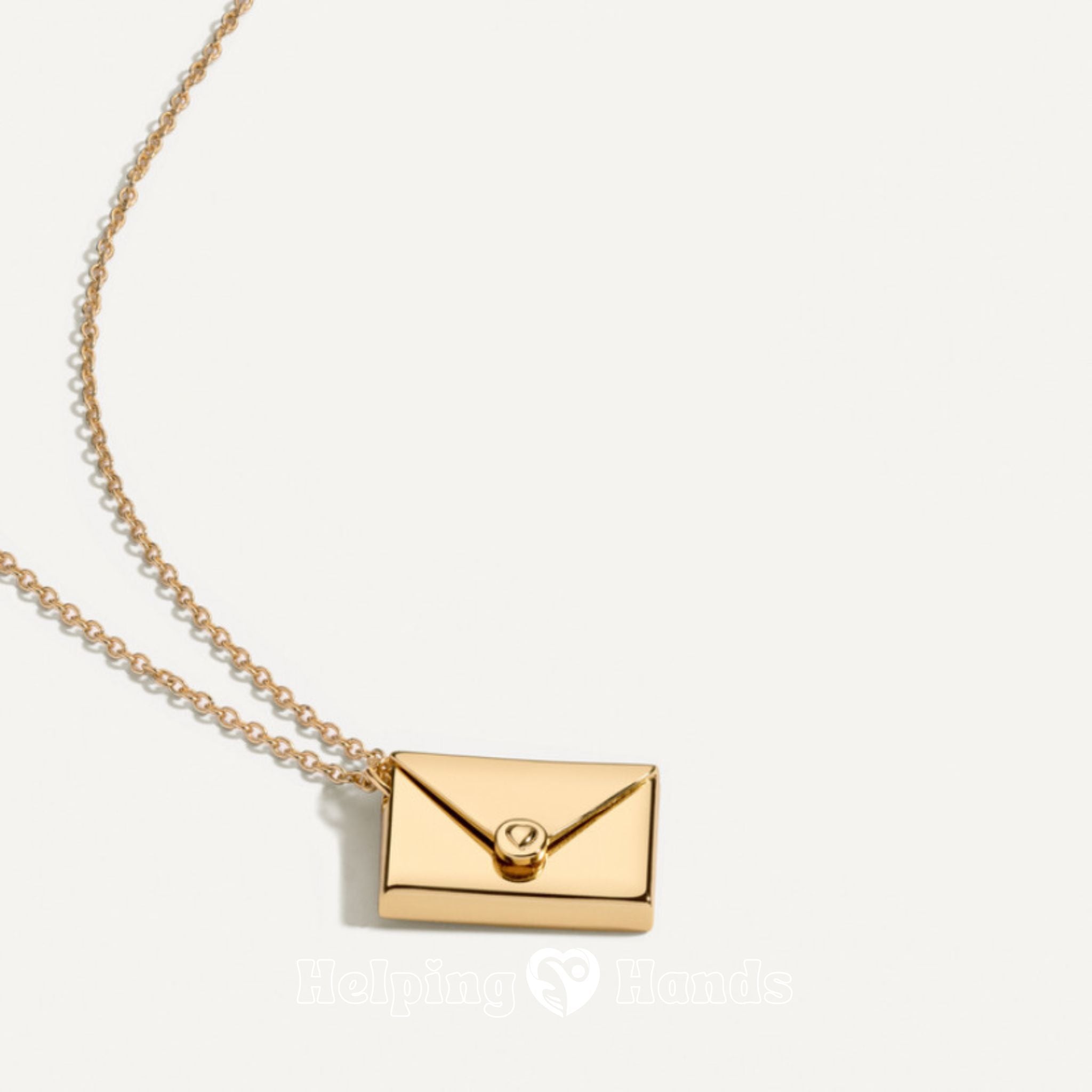 Gold envelope-shaped pendant on a chain against a white background
