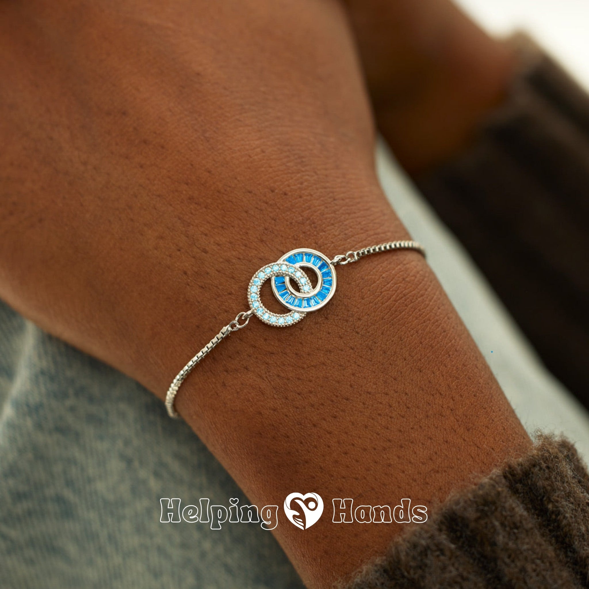 Elegant two-circle bracelet with blue crystals

