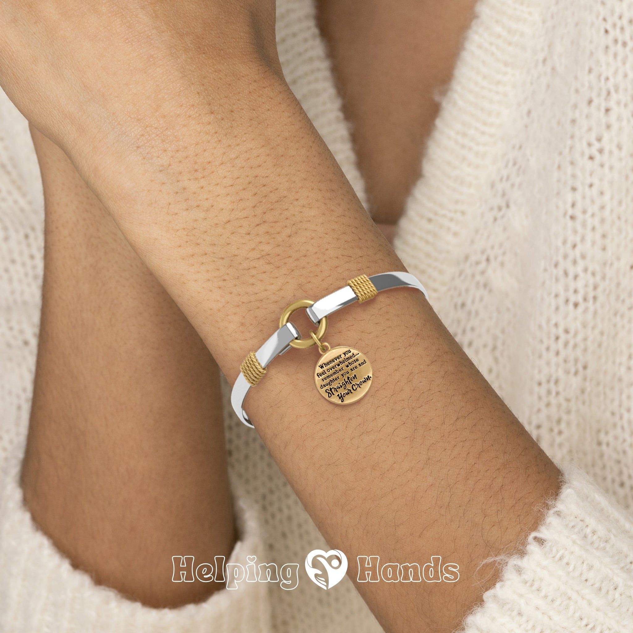 Elegant bangle bracelet with gold-tone inspirational pendant, a meaningful gift for daughters to encourage strength and confidence.

