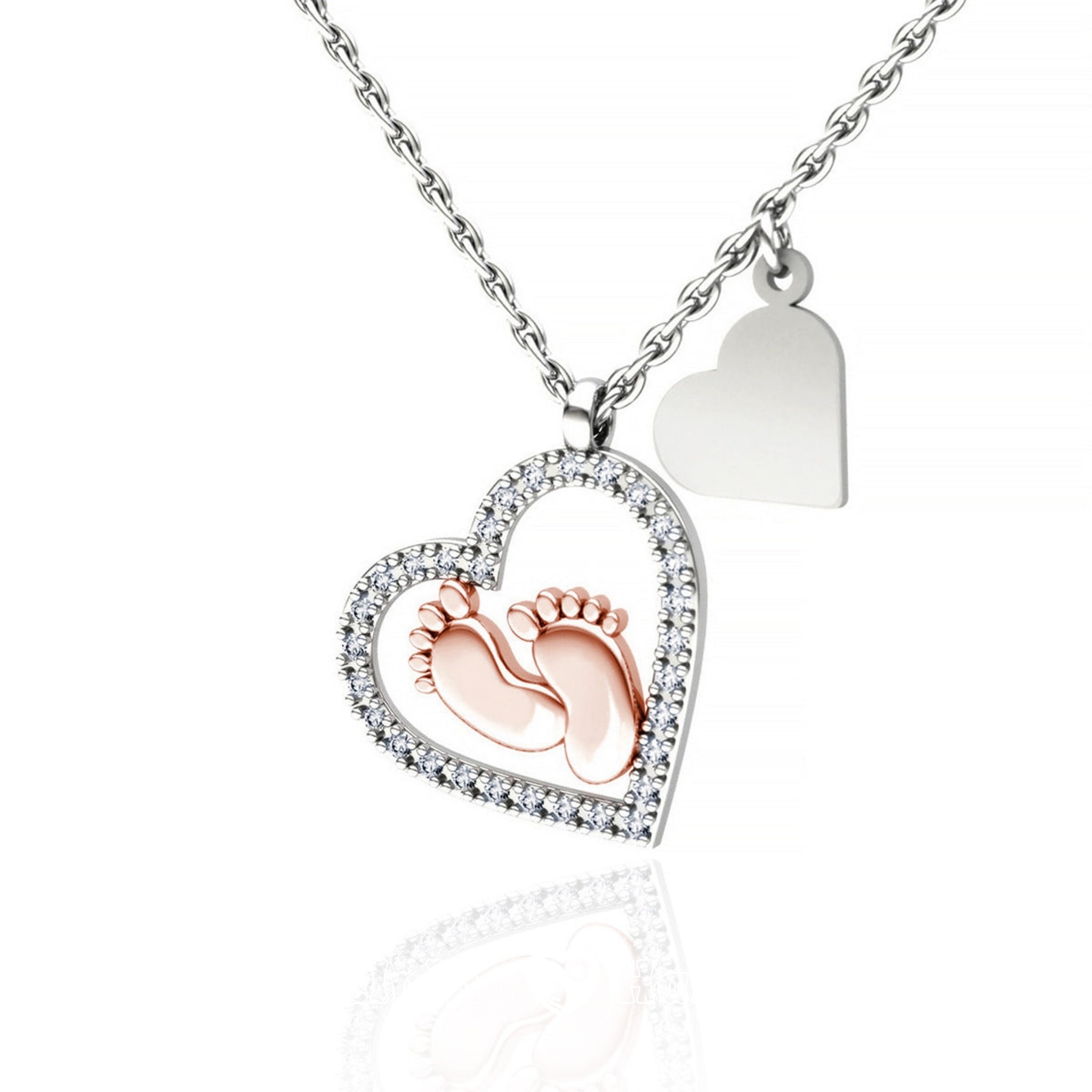 Sentimental maternity gift – silver heart pendant with baby feet charm, symbolizing love between mother and unborn child.

