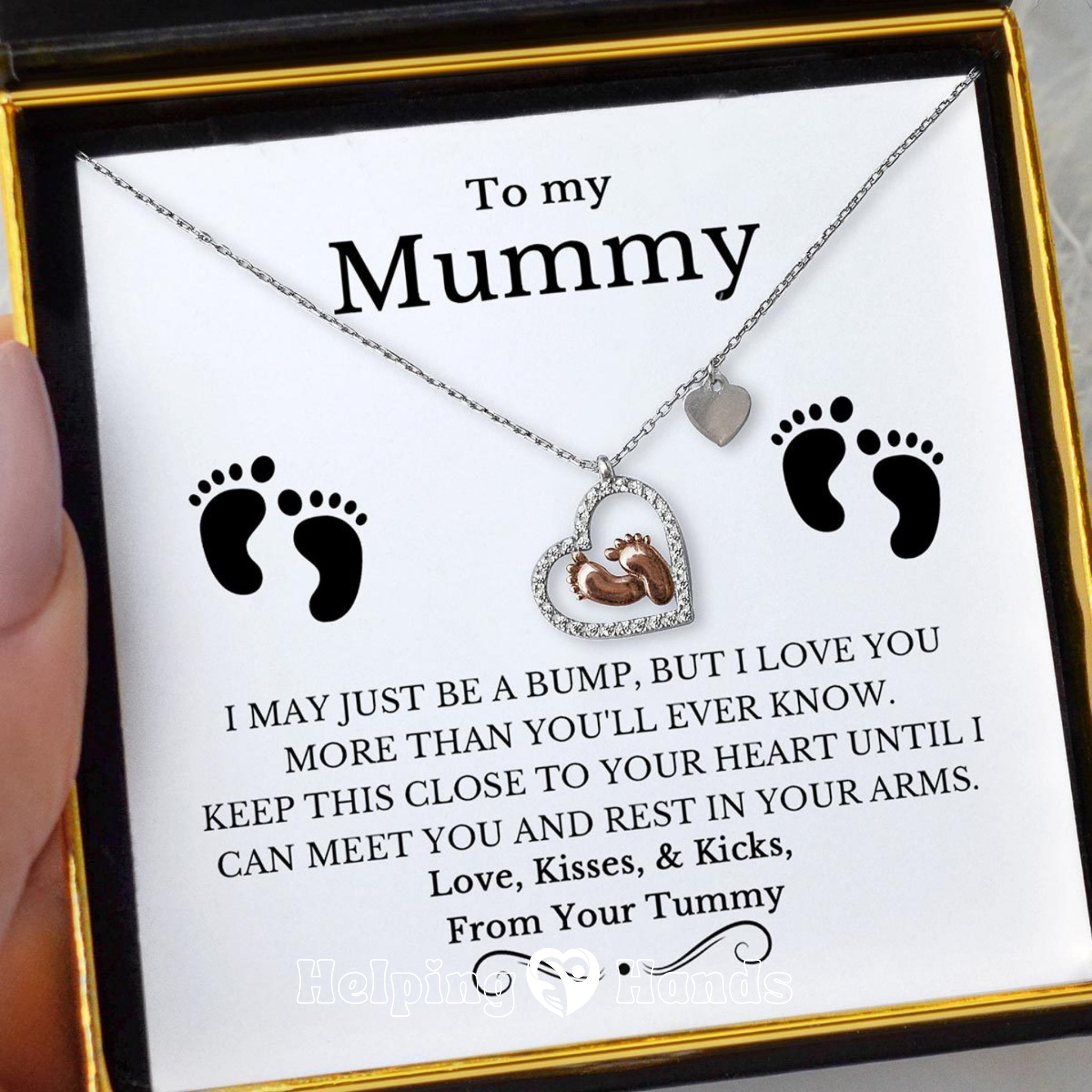 Heart-shaped pendant necklace with baby feet design, presented on a heartfelt ‘To My Mummy’ card – perfect gift from bump to expectant mother.

