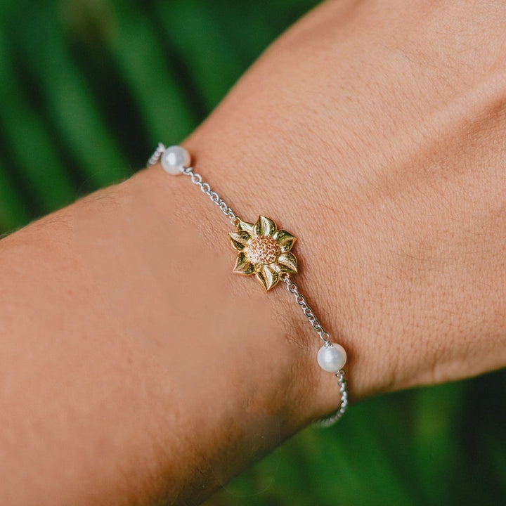Elegant sunflower bracelet with gold petals and beaded accents

