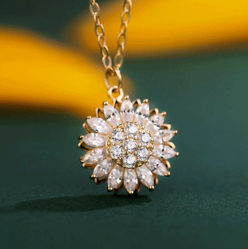 Necklace with rotating crystals