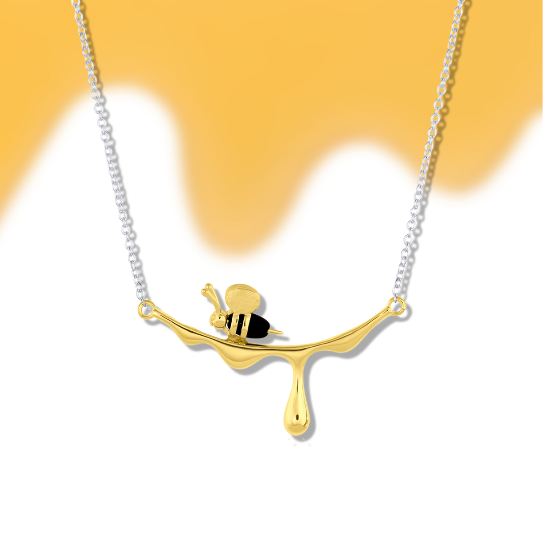 Bring nature into your wardrobe with this cute necklace inspired by bees and honey drops